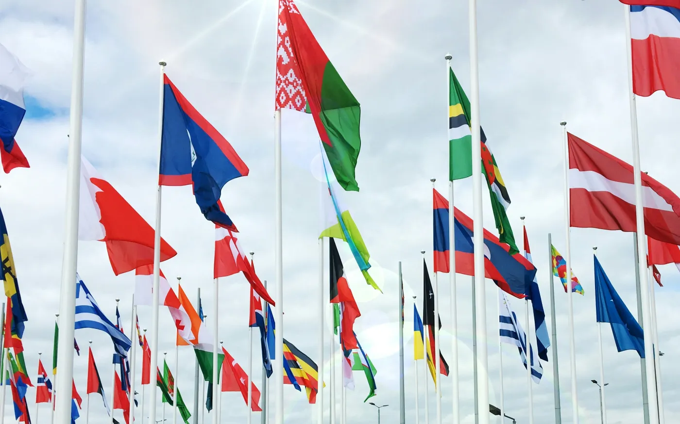 red yellow and green flags by Vladislav Klapin courtesy of Unsplash.