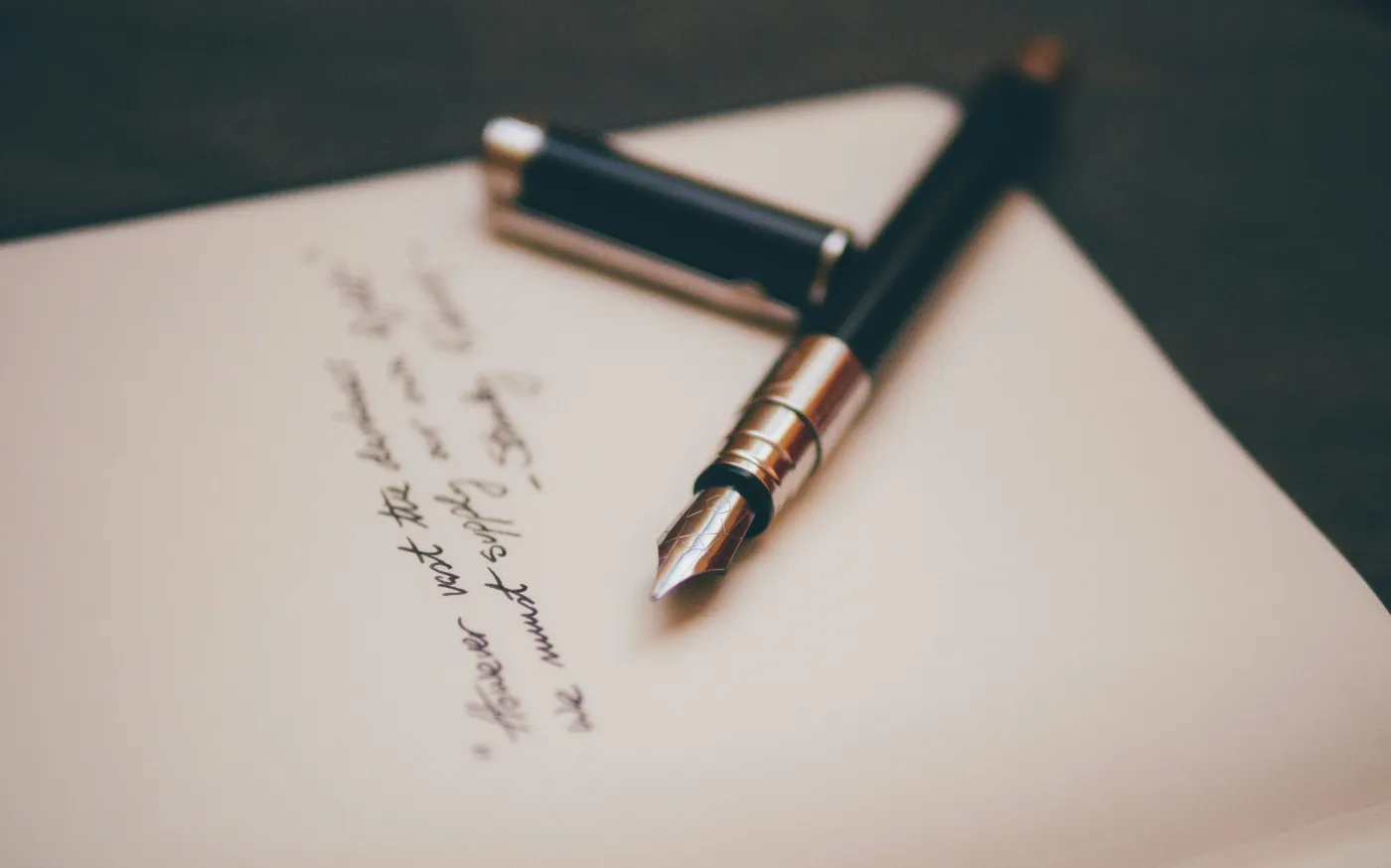 black and silver fountain pen by Álvaro Serrano courtesy of Unsplash.